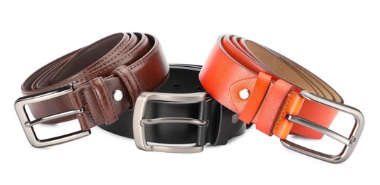 Photo of Three different leather belts isolated on white