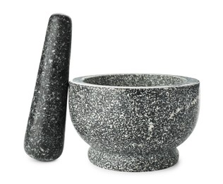 Photo of Stone mortar and pestle isolated on white