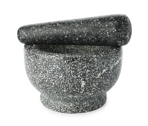 Photo of Stone mortar and pestle isolated on white