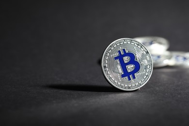 Photo of Cryptocurrency. Silver bitcoins on grey background, closeup. Space for text