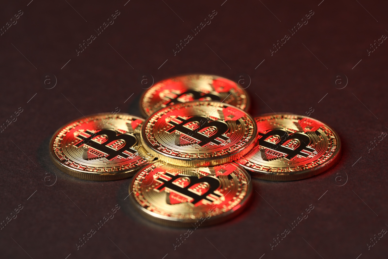 Cryptocurrency. Golden bitcoins on dark background, closeup Photo of Cryptocurrency. Golden bitcoins on dark background, closeup