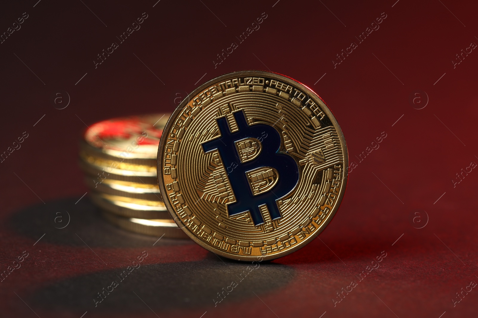Cryptocurrency. Golden bitcoins on dark background, closeup Photo of Cryptocurrency. Golden bitcoins on dark background, closeup