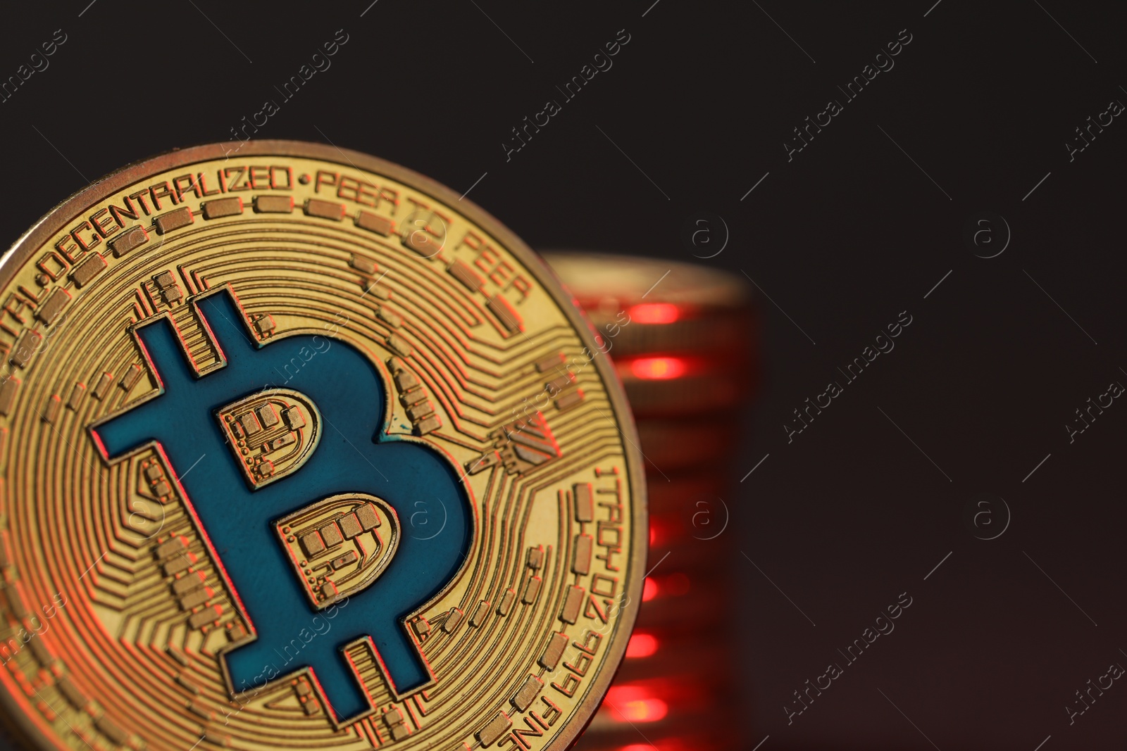 Cryptocurrency. Golden bitcoins on dark background, closeup. Space for text Photo of Cryptocurrency. Golden bitcoins on dark background, closeup. Space for text