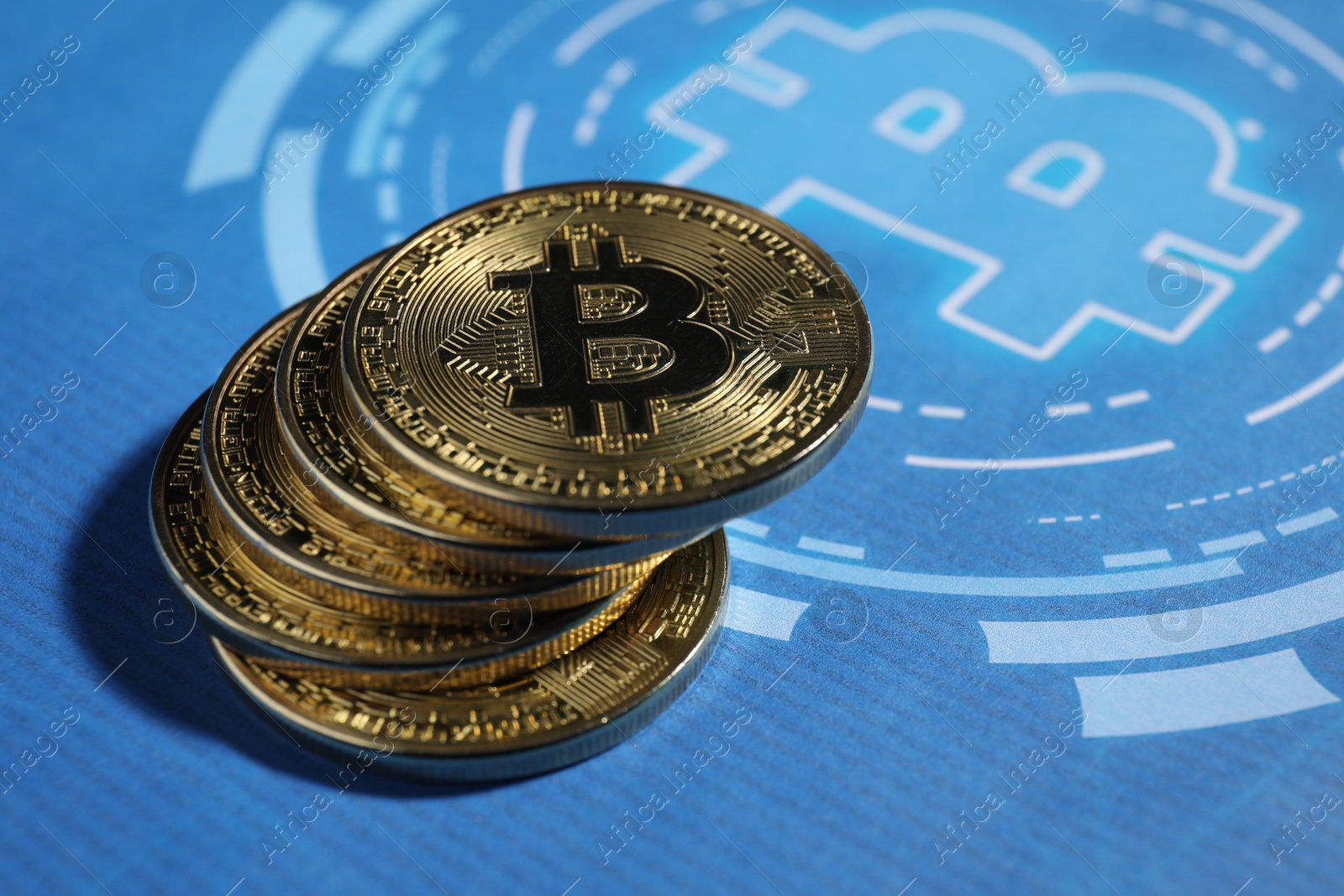 Stack of bitcoins on cryptocurrency symbol, closeup. Space for text Photo of Stack of bitcoins on cryptocurrency symbol, closeup. Space for text