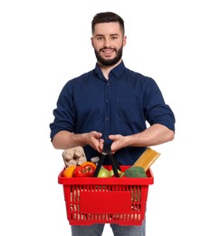Photo of Man with shopping basket full of products on white background