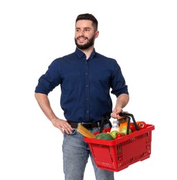 Photo of Man with shopping basket full of products on white background