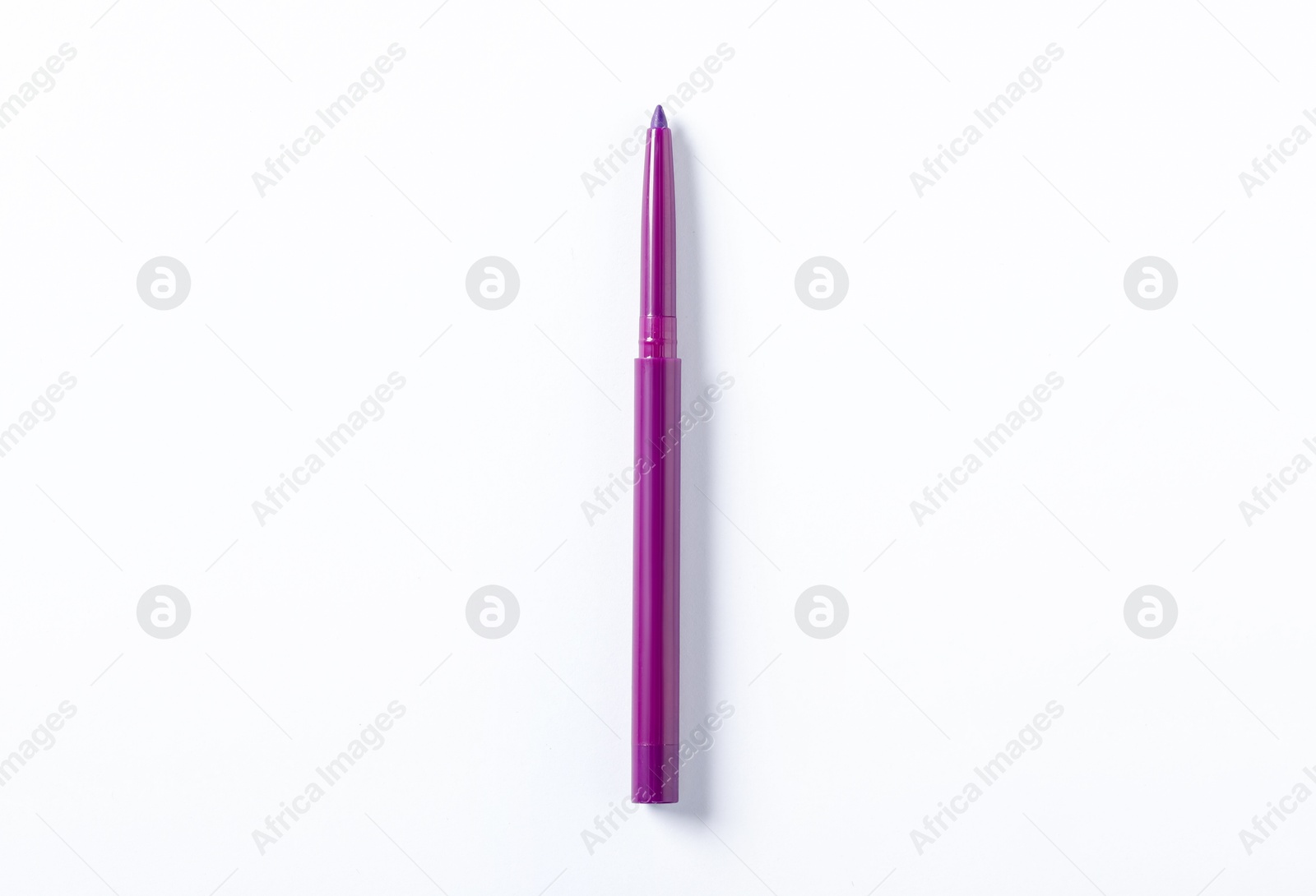 One twist up eye pencil on white background, top view Photo of One twist up eye pencil on white background, top view