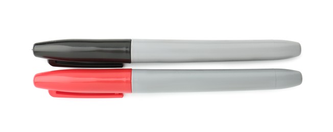 Photo of Two color markers isolated on white, top view