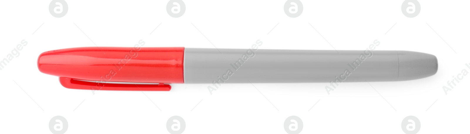 One red marker isolated on white, top view Photo of One red marker isolated on white, top view