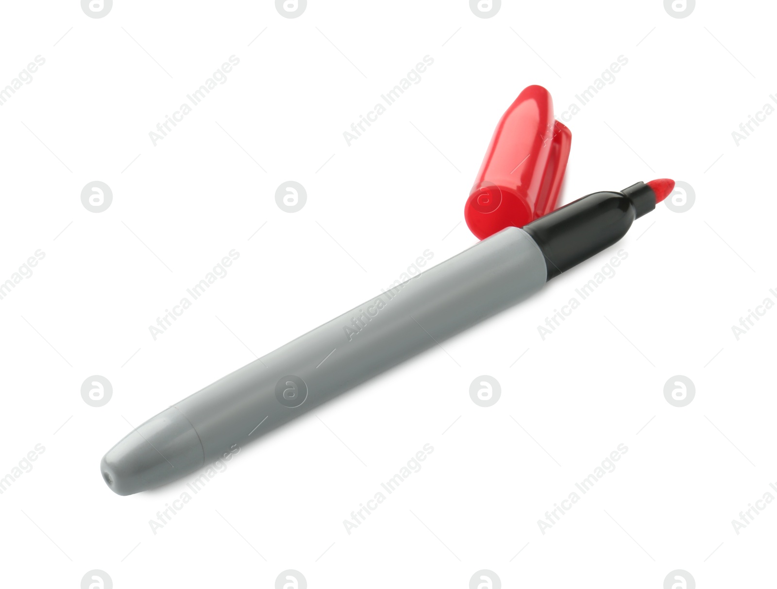 One red marker with cap isolated on white Photo of One red marker with cap isolated on white