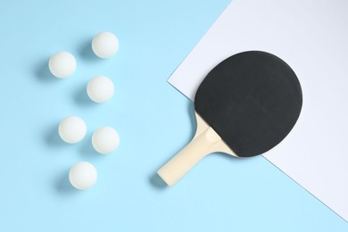 Photo of Ping pong racket and balls on color background, flat lay