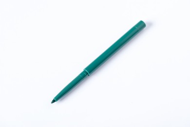 Photo of One twist up eye pencil on white background, above view