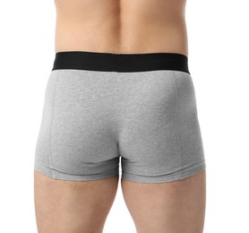 Photo of Young man in stylish light grey underwear on white background, closeup