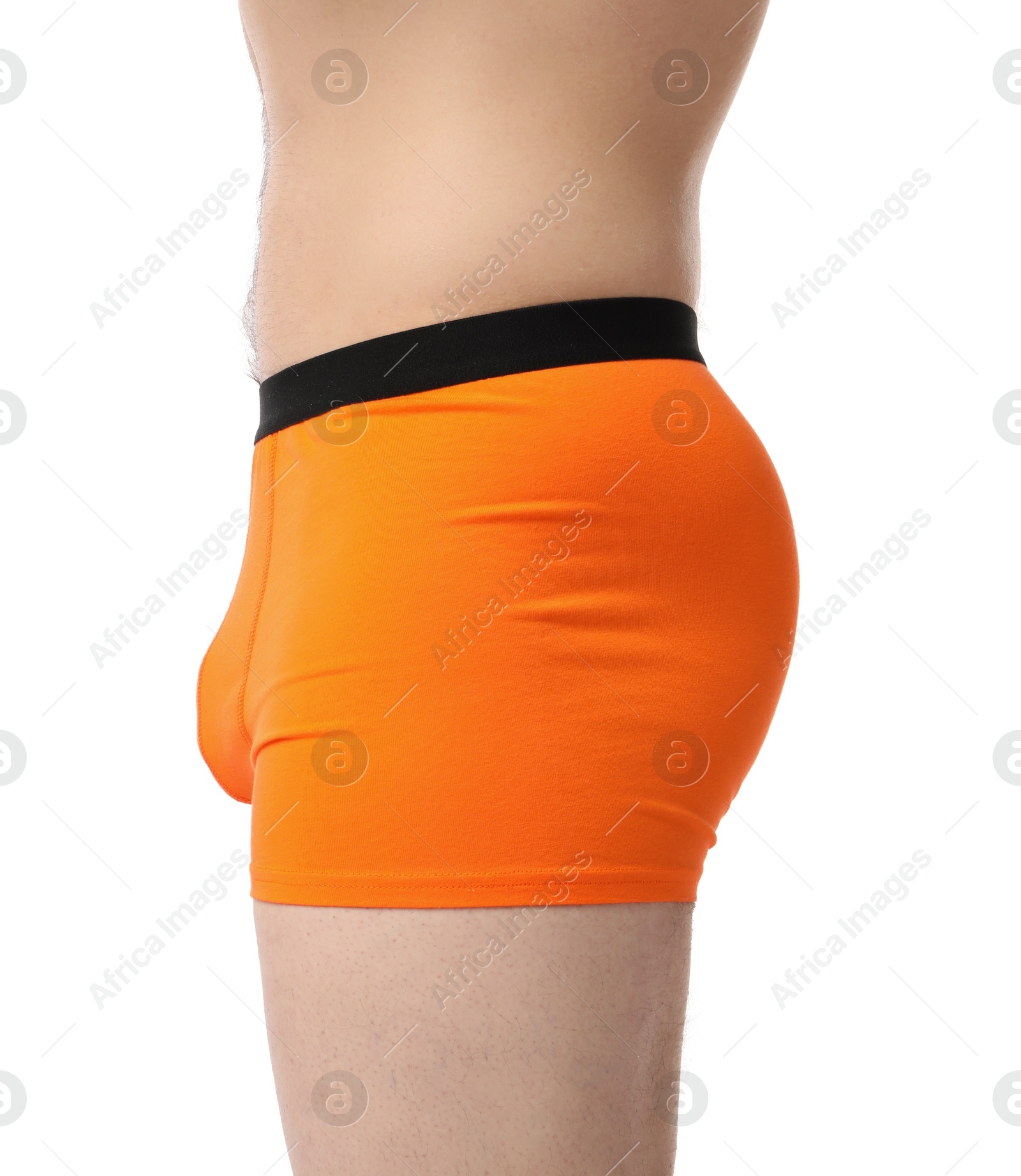 Young man in stylish orange underwear on white background, closeup Photo of Young man in stylish orange underwear on white background, closeup