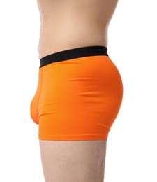 Photo of Young man in stylish orange underwear on white background, closeup