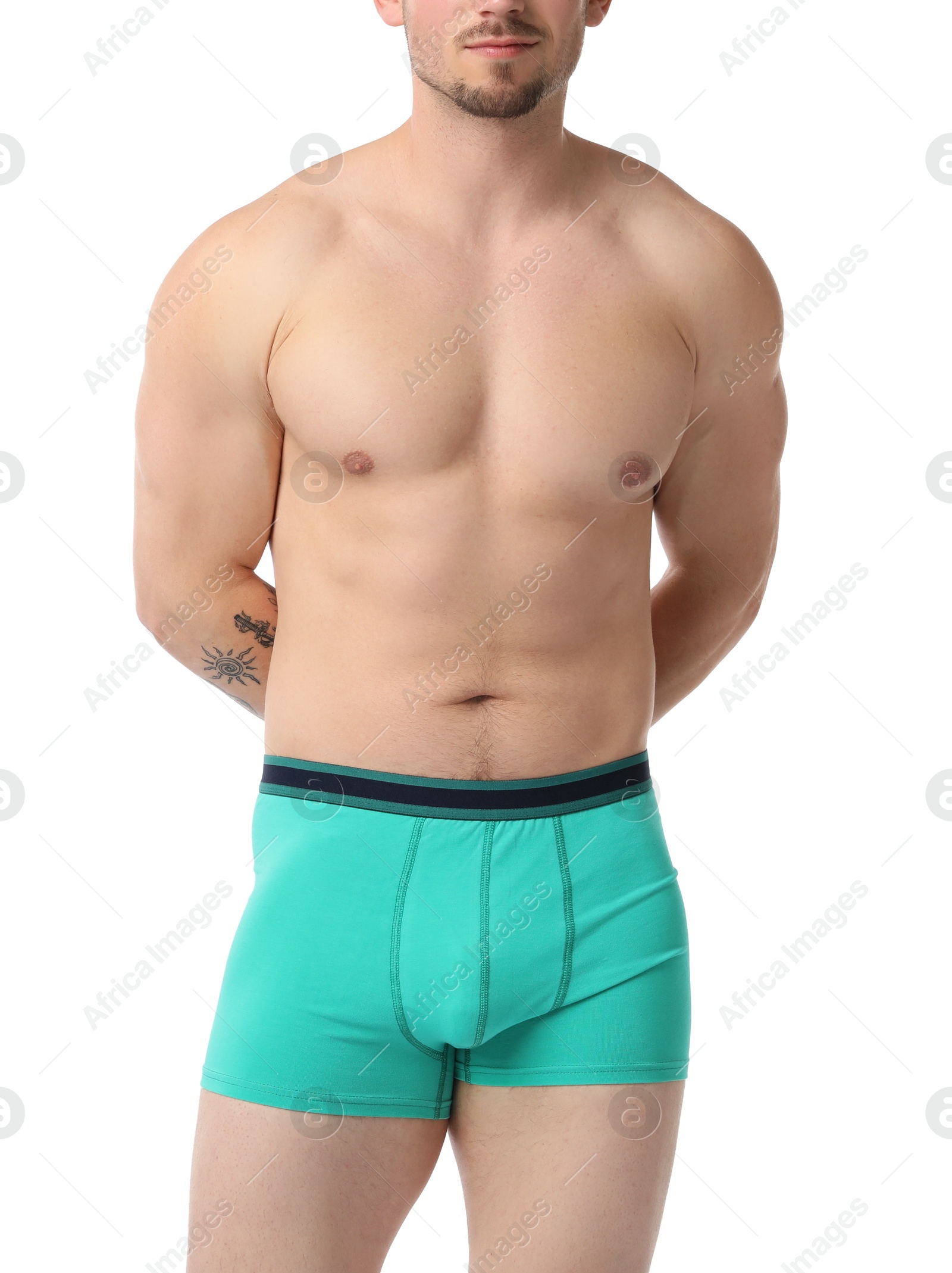 Young man in stylish turquoise underwear on white background, closeup Photo of Young man in stylish turquoise underwear on white background, closeup