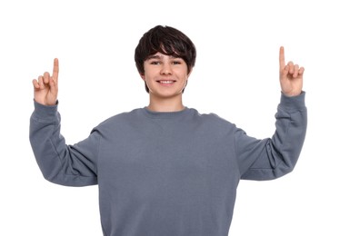 Photo of Portrait of teenage boy on white background
