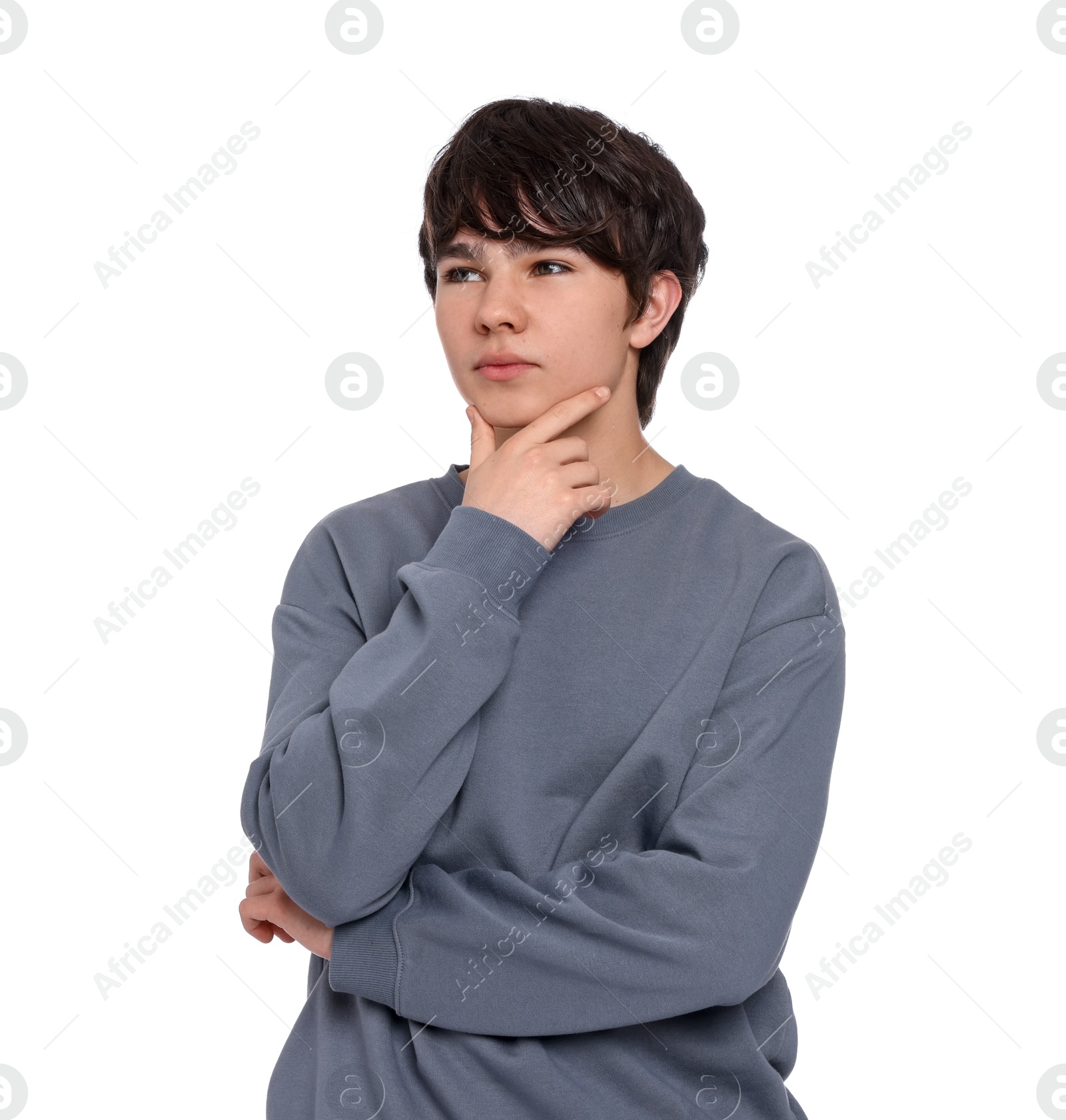 Portrait of teenage boy on white background Photo of Portrait of teenage boy on white background