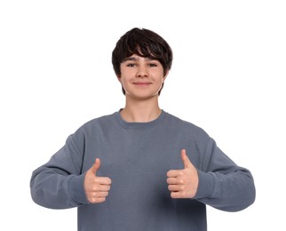 Photo of Teenage boy showing thumbs up on white background