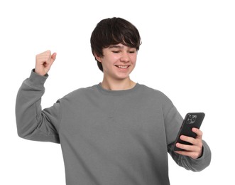 Photo of Teenage boy with smartphone on white background