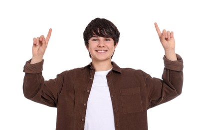 Photo of Portrait of teenage boy on white background