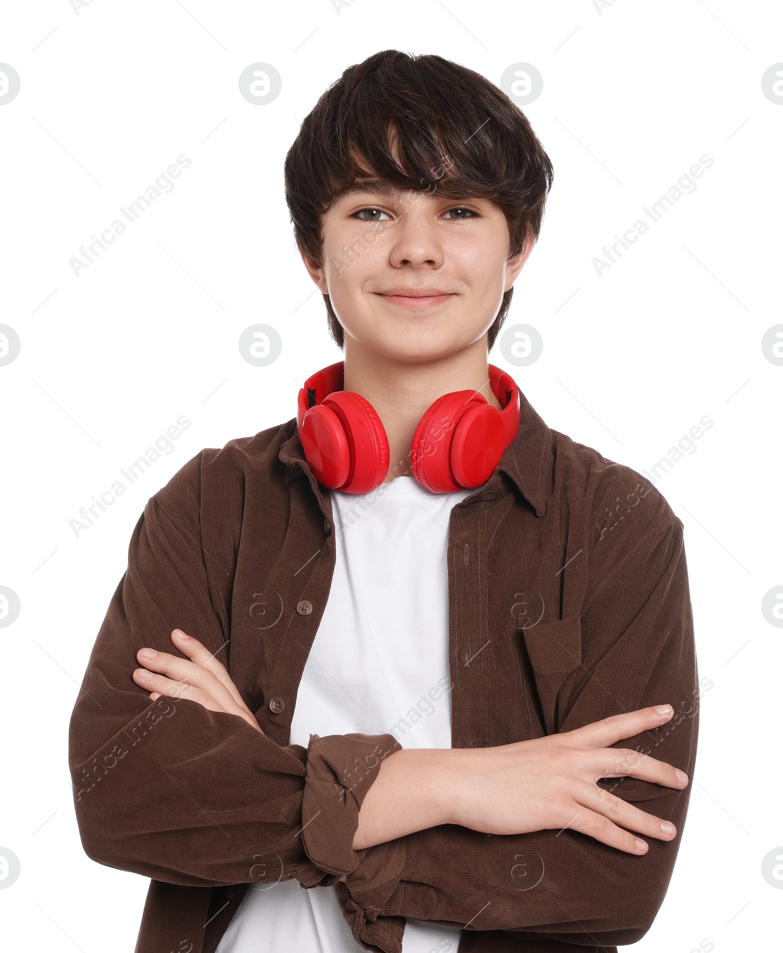 Teenage boy with headphones on white background Photo of Teenage boy with headphones on white background