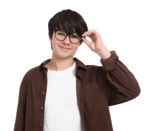 Photo of Portrait of teenage boy in glasses on white background