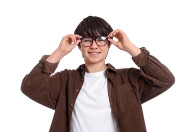 Photo of Portrait of teenage boy in glasses on white background