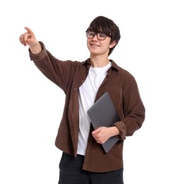 Photo of Teenage boy in glasses with laptop on white background