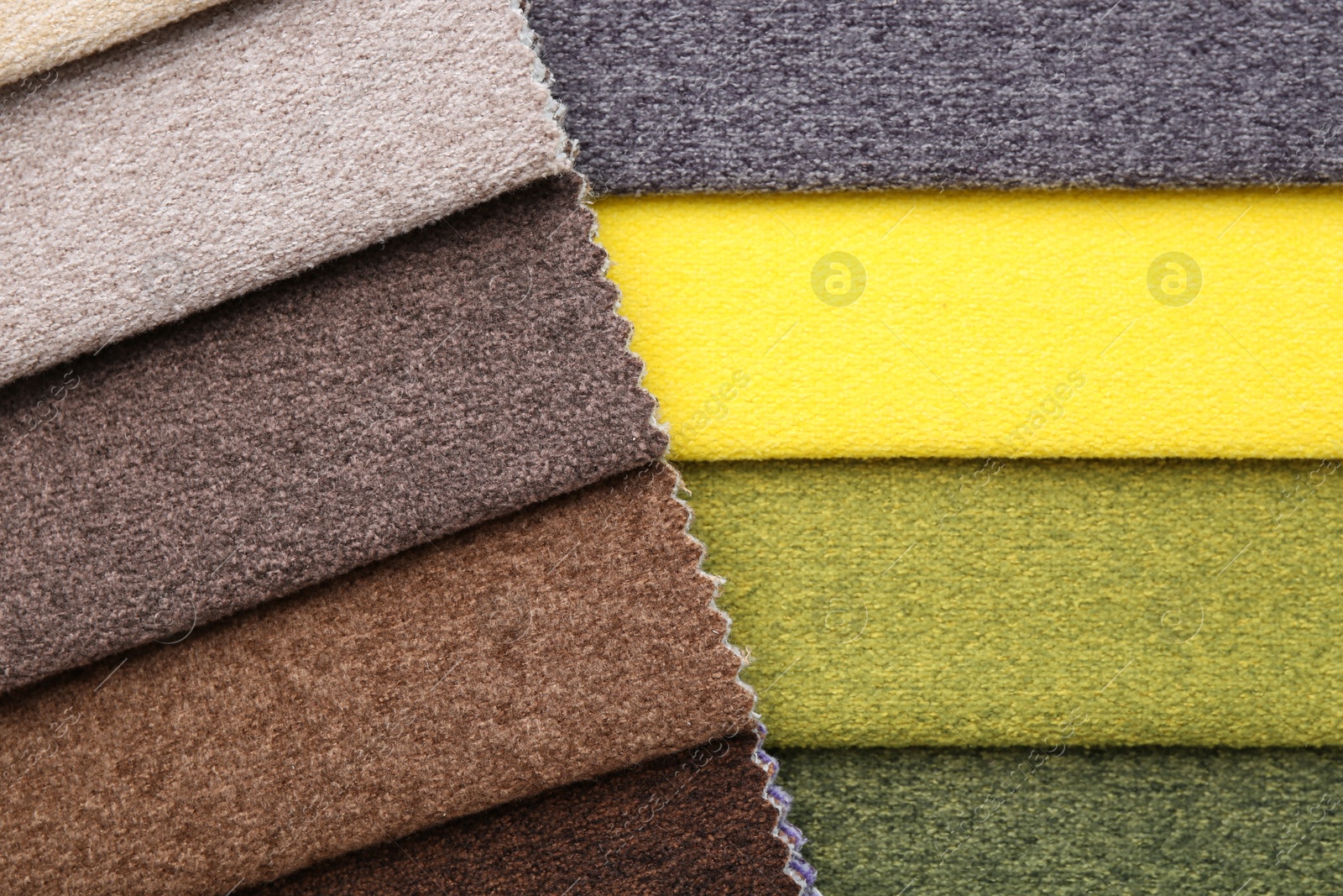 Samples of different fabrics as background, top view Photo of Samples of different fabrics as background, top view
