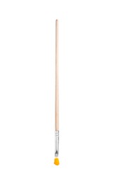 Photo of Brush with orange paint isolated on white