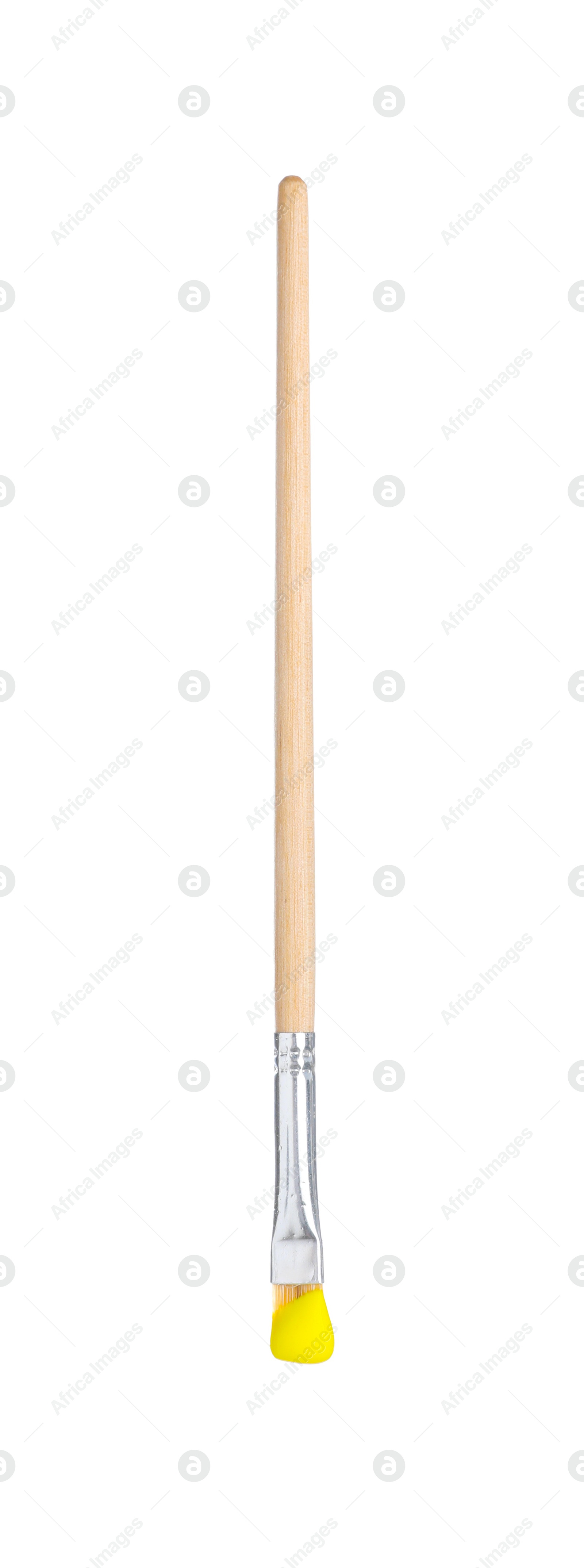 Brush with yellow paint isolated on white Photo of Brush with yellow paint isolated on white