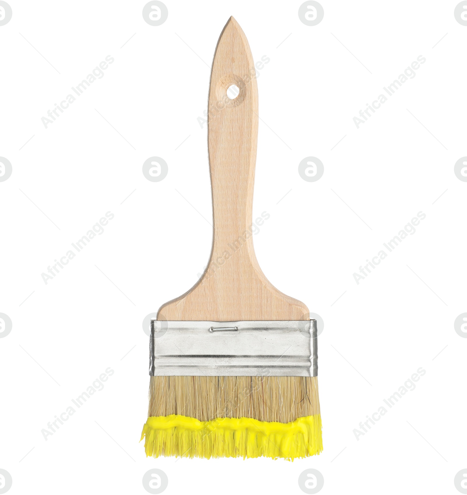 Brush with yellow paint isolated on white Photo of Brush with yellow paint isolated on white