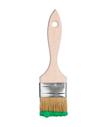 Photo of Brush with green paint isolated on white