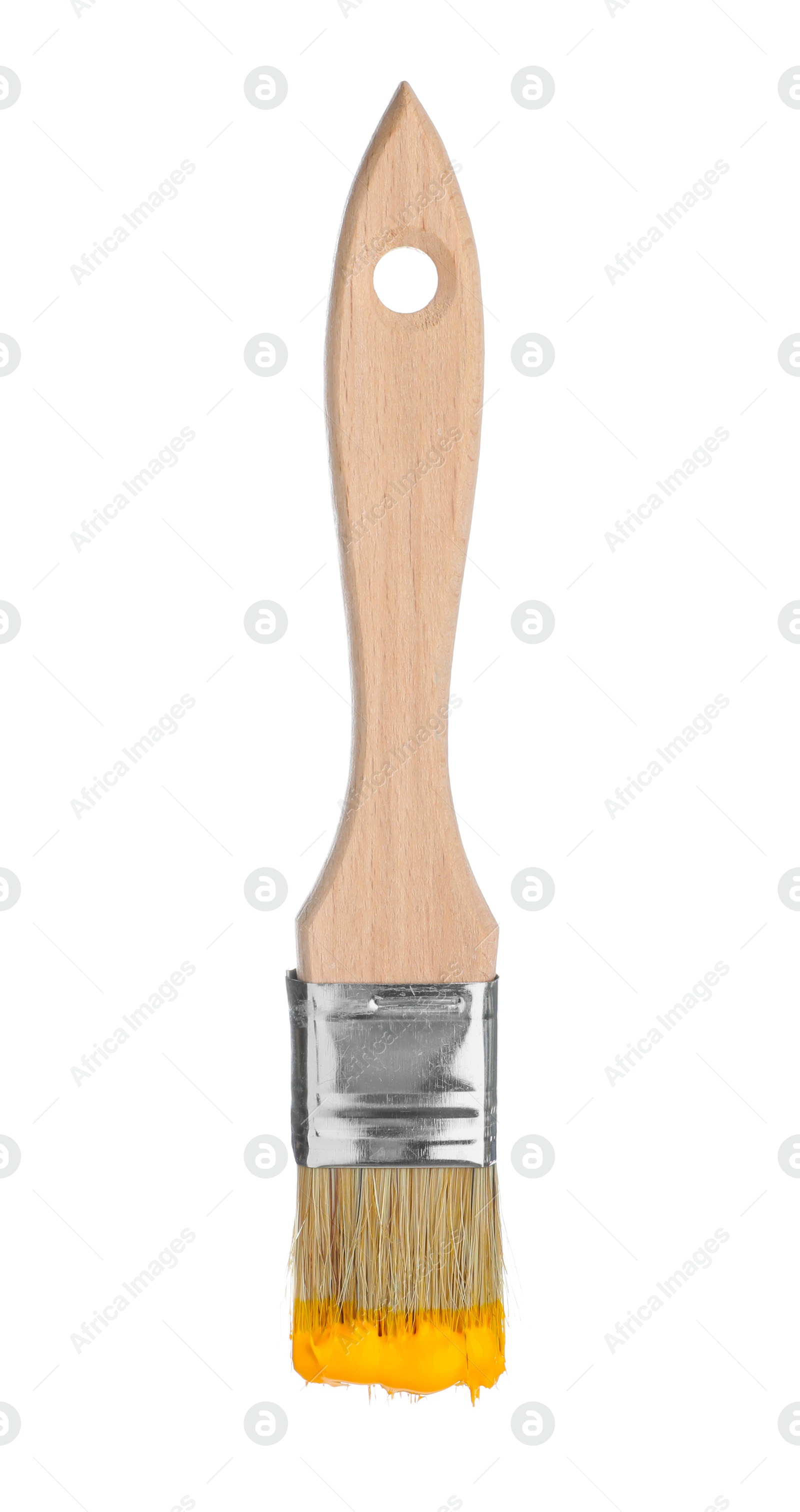 Brush with orange paint isolated on white Photo of Brush with orange paint isolated on white