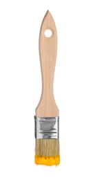 Photo of Brush with orange paint isolated on white