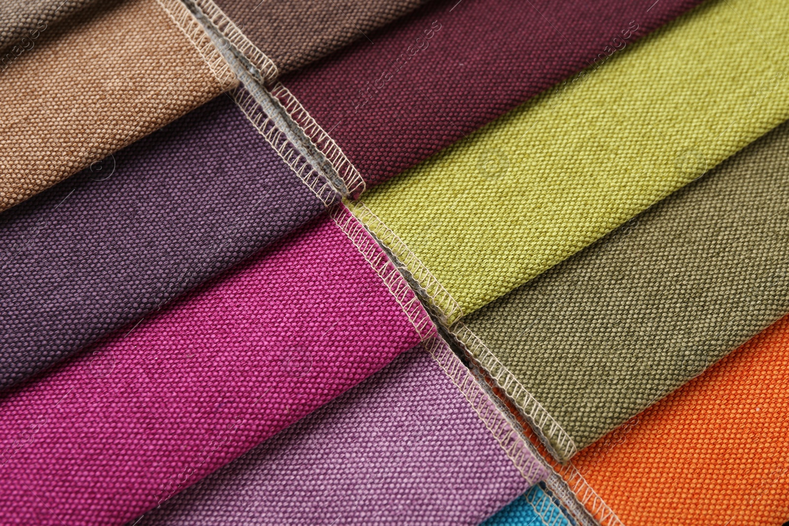 Samples of different fabrics as background, closeup Photo of Samples of different fabrics as background, closeup