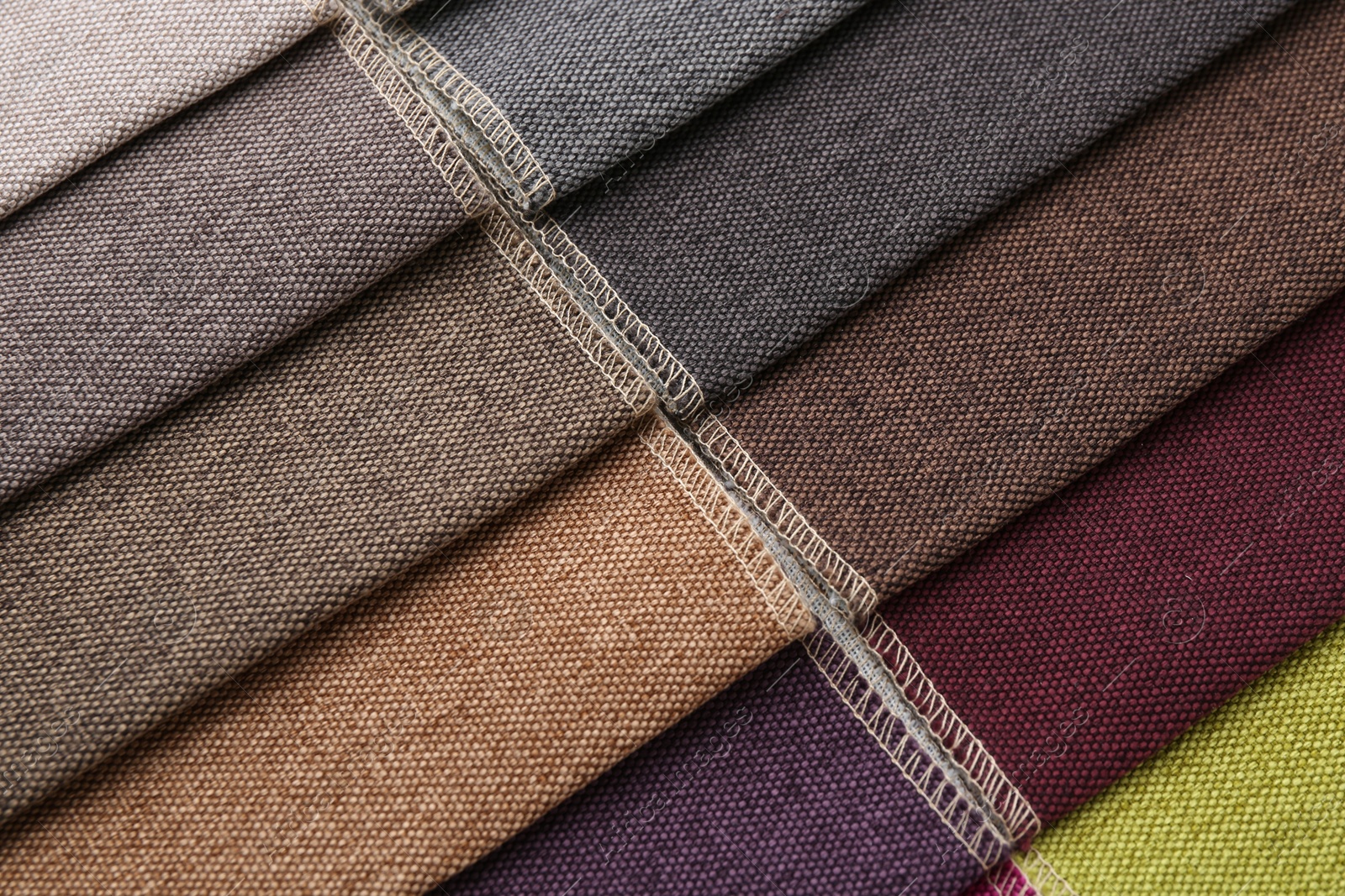 Samples of different fabrics as background, closeup Photo of Samples of different fabrics as background, closeup