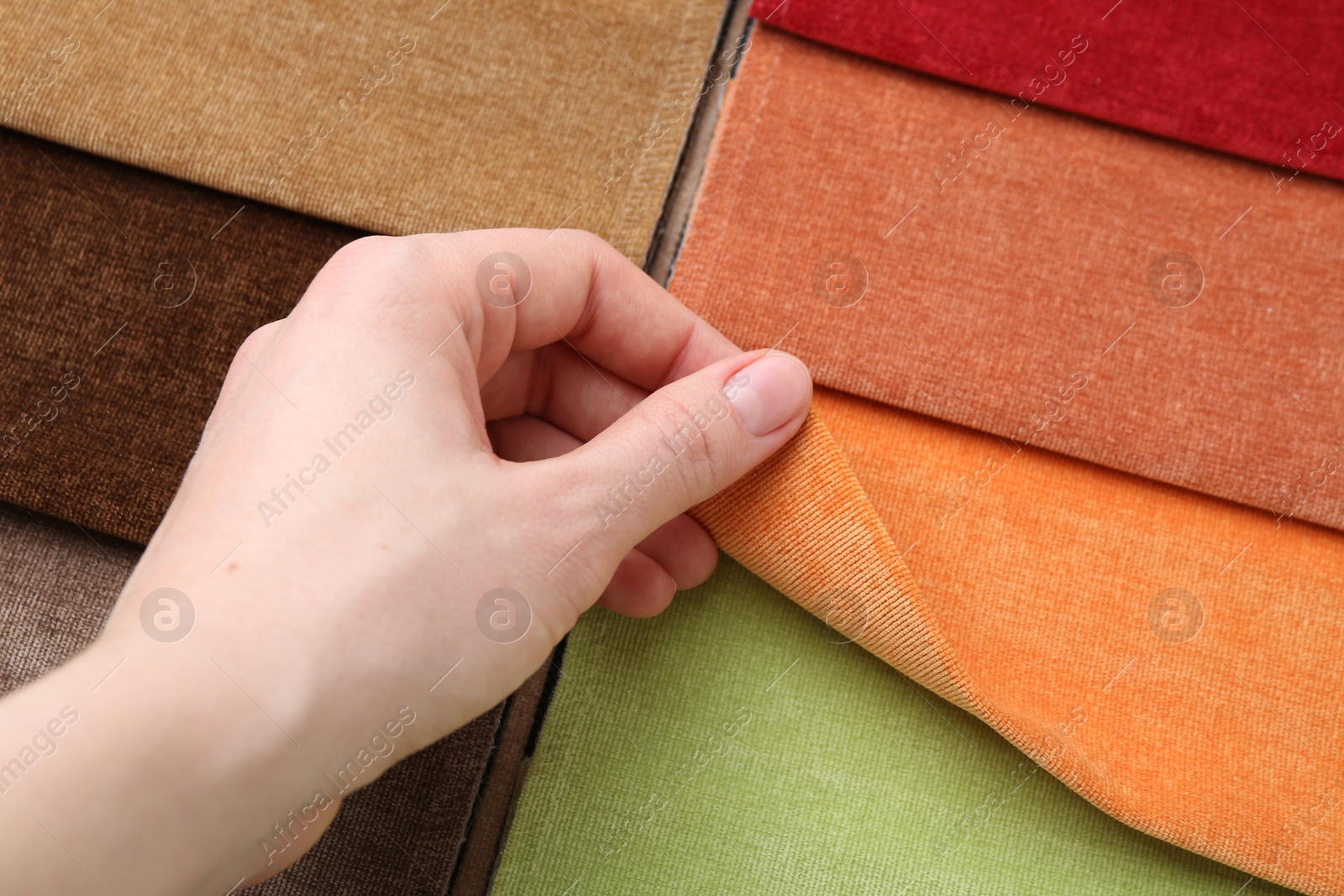 Woman with samples of different fabrics, closeup Photo of Woman with samples of different fabrics, closeup