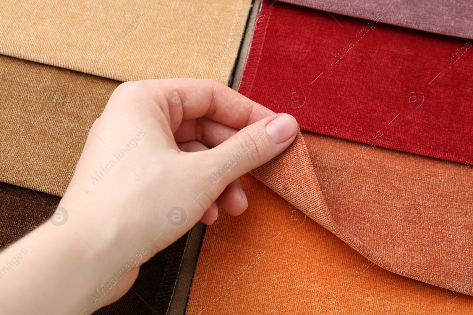 Woman with samples of different fabrics, closeup Photo of Woman with samples of different fabrics, closeup