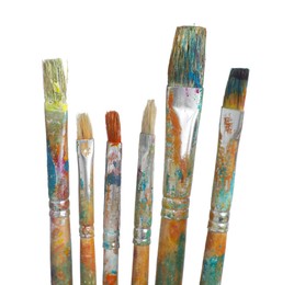 Photo of Brushes with different paints isolated on white