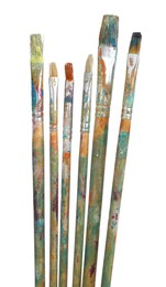 Photo of Brushes with different paints isolated on white