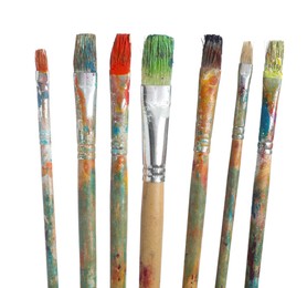 Photo of Brushes with different paints isolated on white