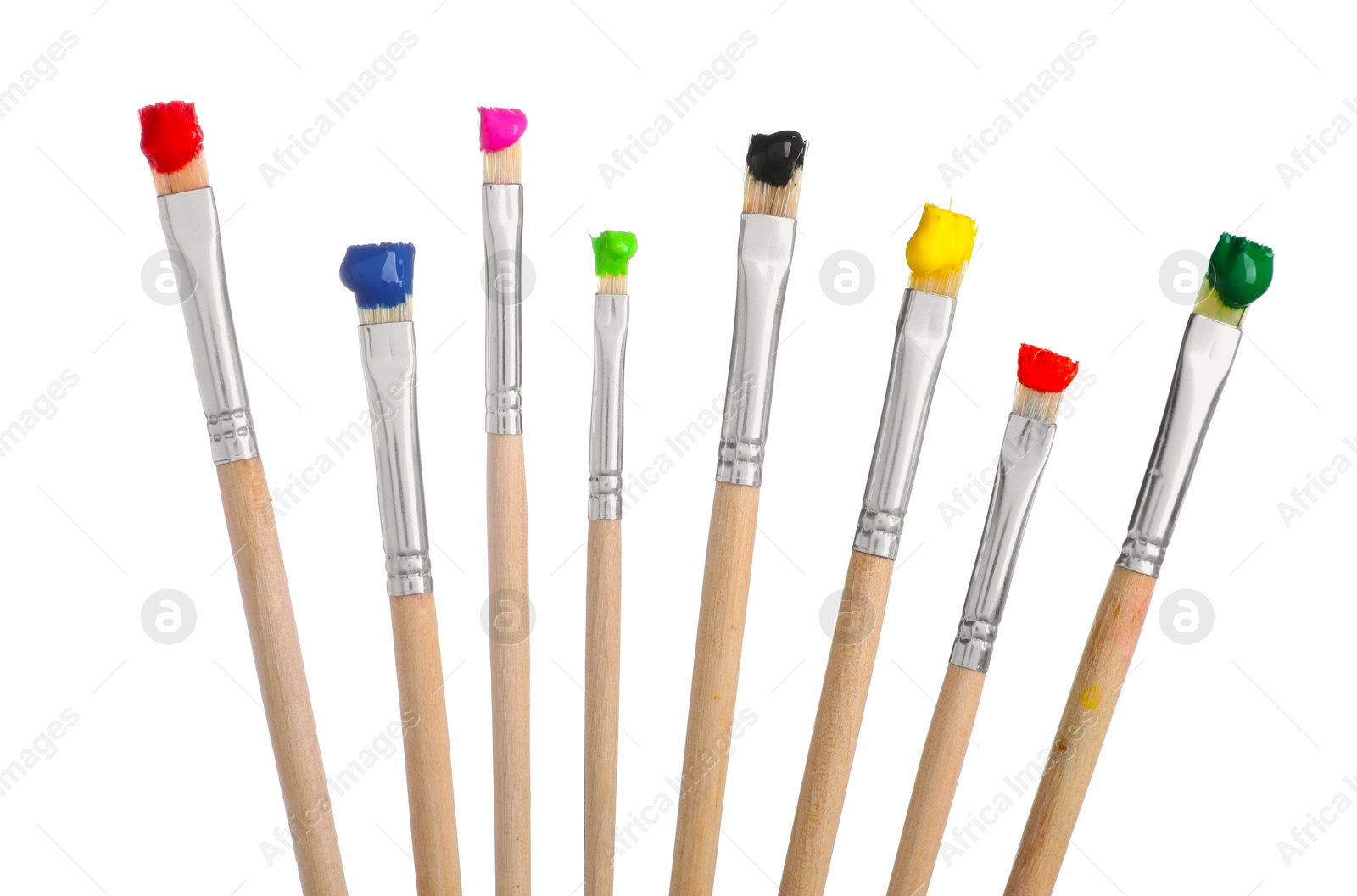 Brushes with different paints isolated on white Photo of Brushes with different paints isolated on white
