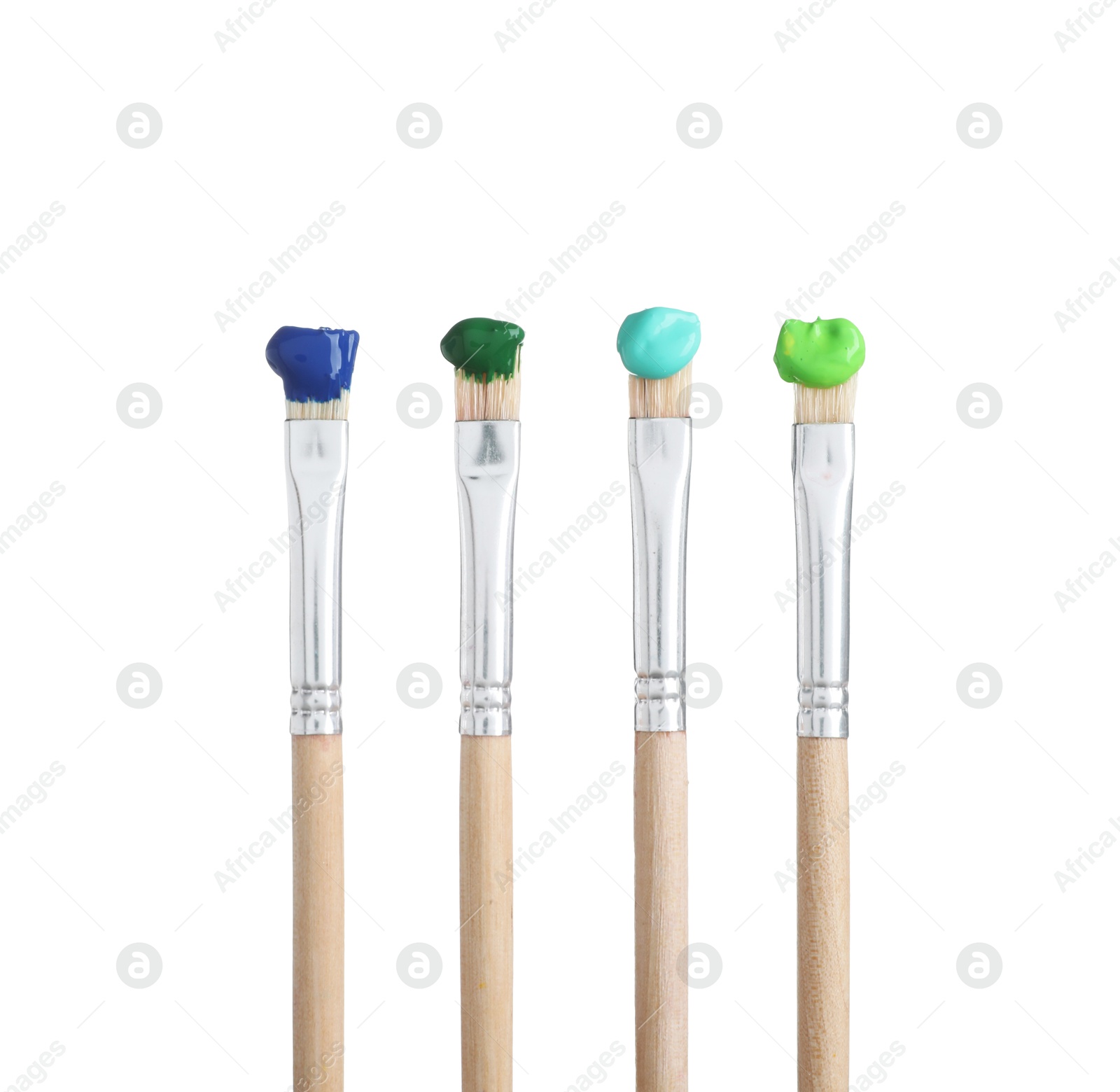 Brushes with different paints isolated on white Photo of Brushes with different paints isolated on white