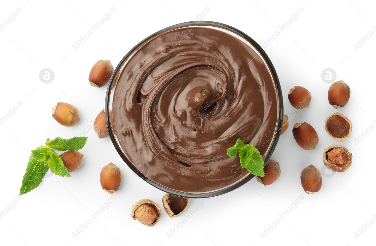 Tasty chocolate spread with mint and hazelnuts isolated on white, top view Photo of Tasty chocolate spread with mint and hazelnuts isolated on white, top view