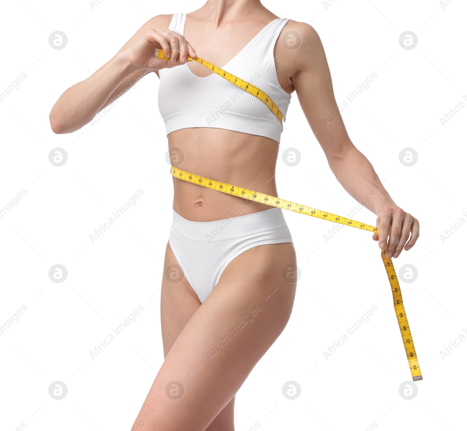 Woman with slim body and measuring tape on white background, closeup Photo of Woman with slim body and measuring tape on white background, closeup
