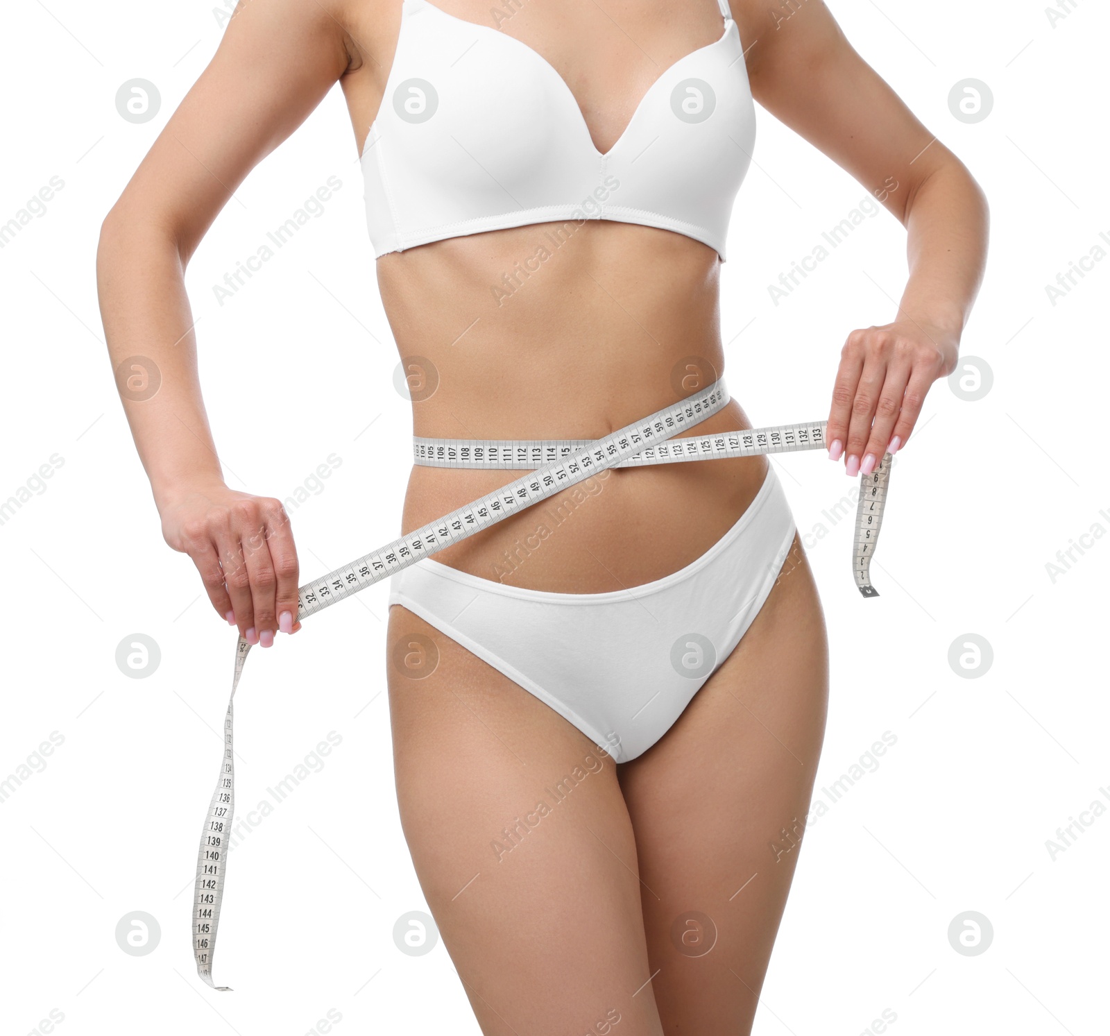 Woman with slim body and measuring tape on white background, closeup Photo of Woman with slim body and measuring tape on white background, closeup