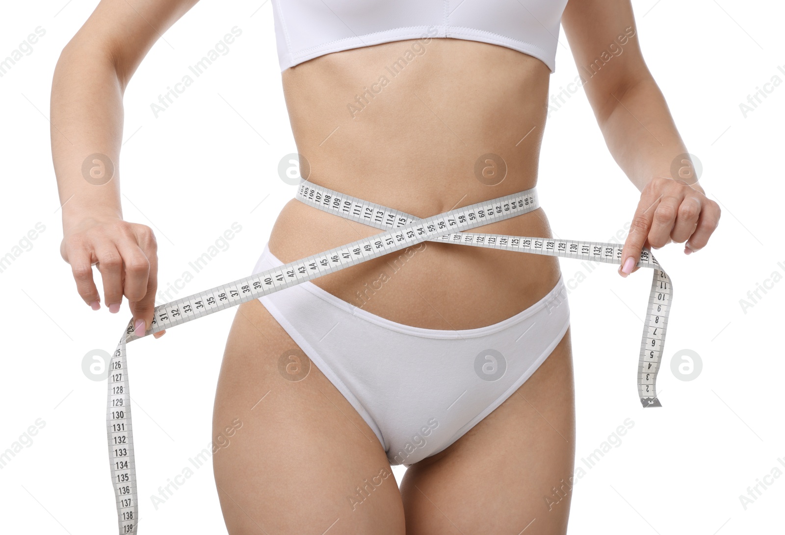 Woman with slim body and measuring tape on white background, closeup Photo of Woman with slim body and measuring tape on white background, closeup