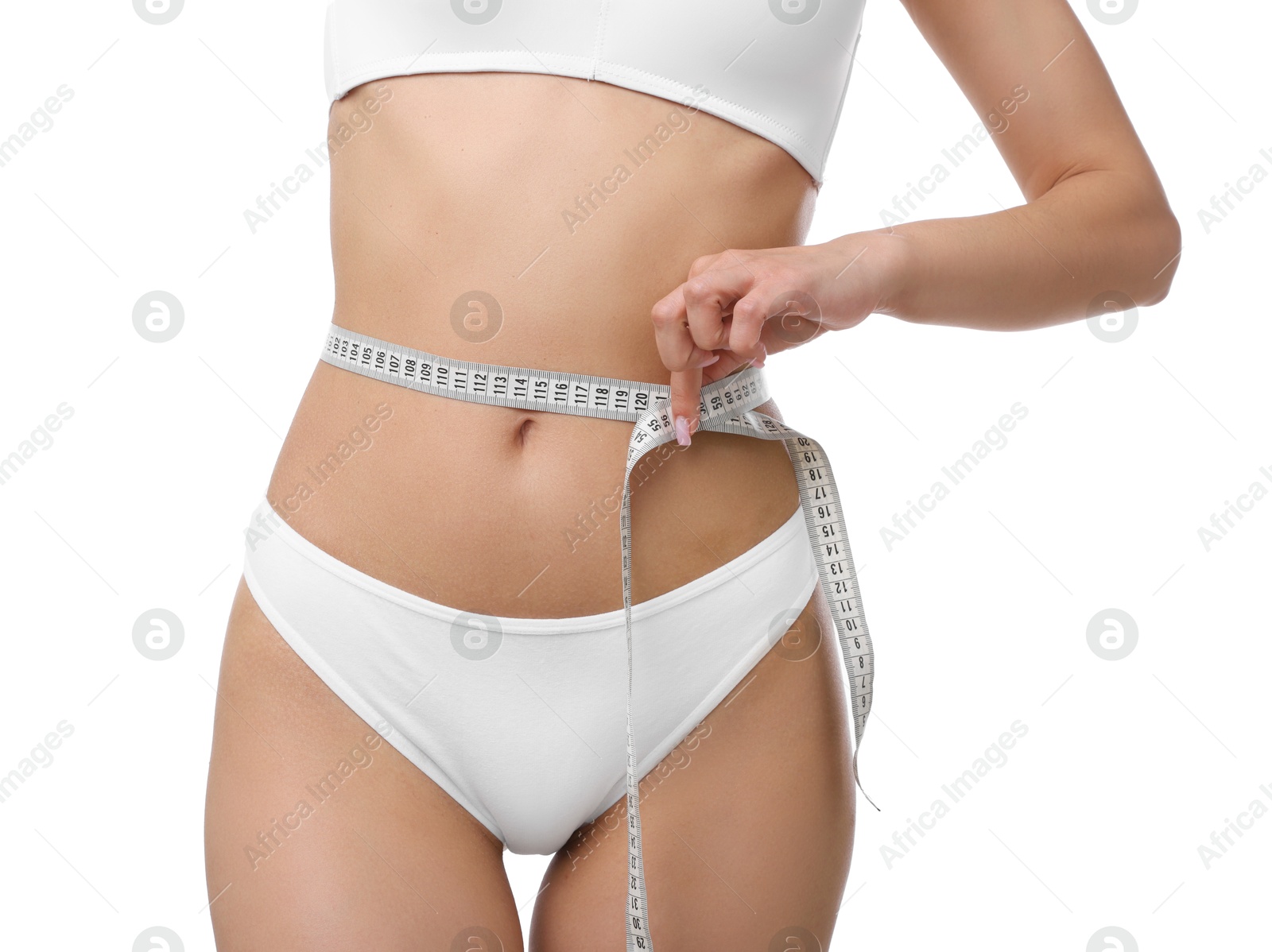 Woman with slim body and measuring tape on white background, closeup Photo of Woman with slim body and measuring tape on white background, closeup
